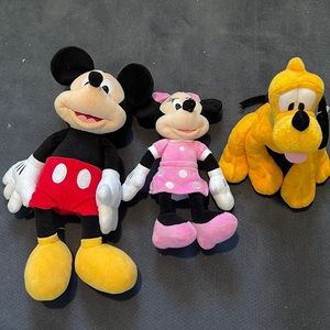 Mickey, Minnie, and Pluto stuffies